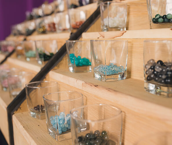 glasses filled with various gemstones